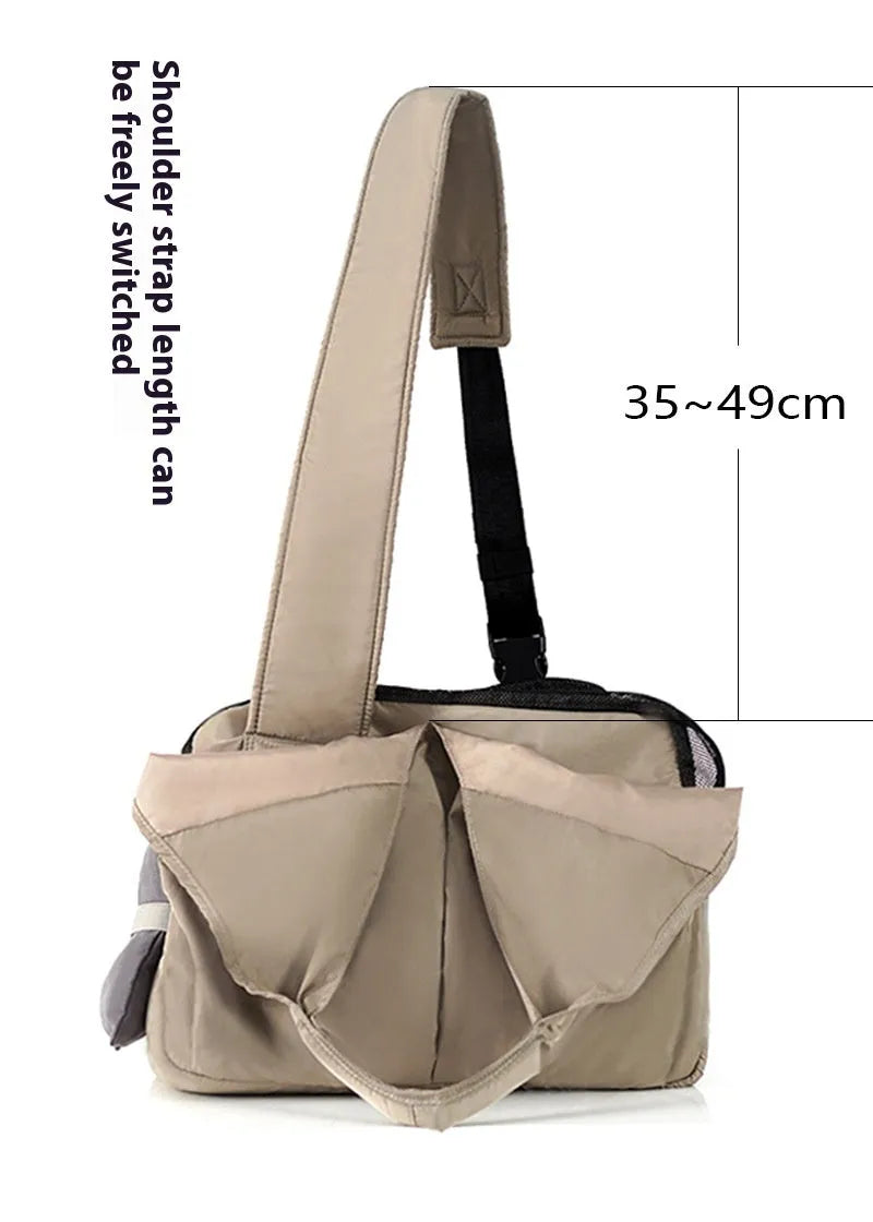 Apricot-colour cloth pet carrier handbag with mesh panels and a shoulder strap.