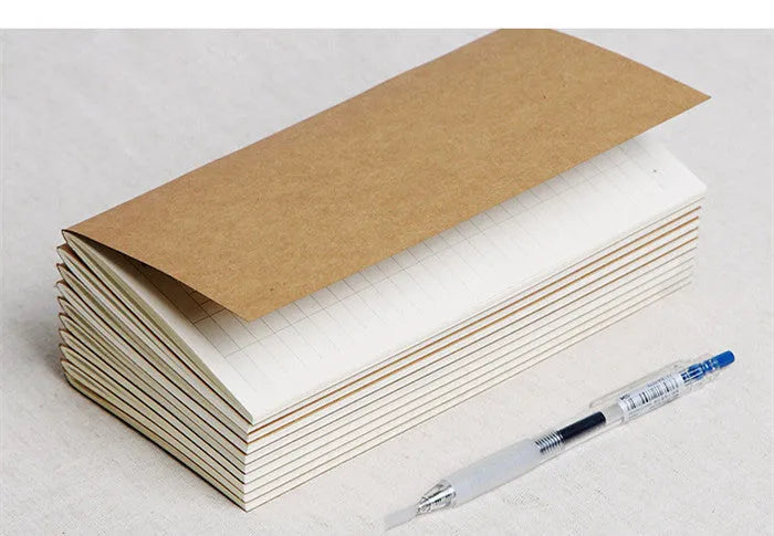 Cowhide diary refill insert showing dot grid and ruled pages with 11x21cm dimensions