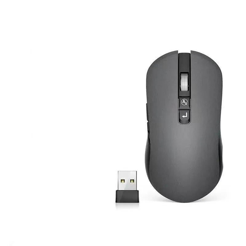 White wireless IFLYTEK gaming mouse with seven buttons on a desk next to a laptop, showcasing its USB receiver.