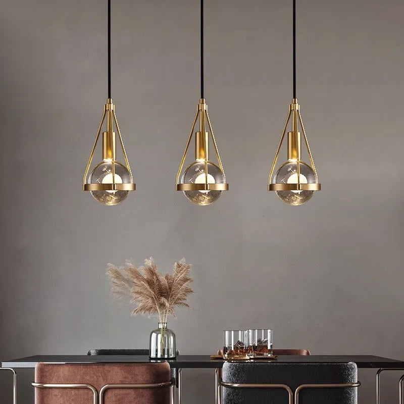 Modern copper and crystal chandelier light fixture for bedroom or commercial use.
