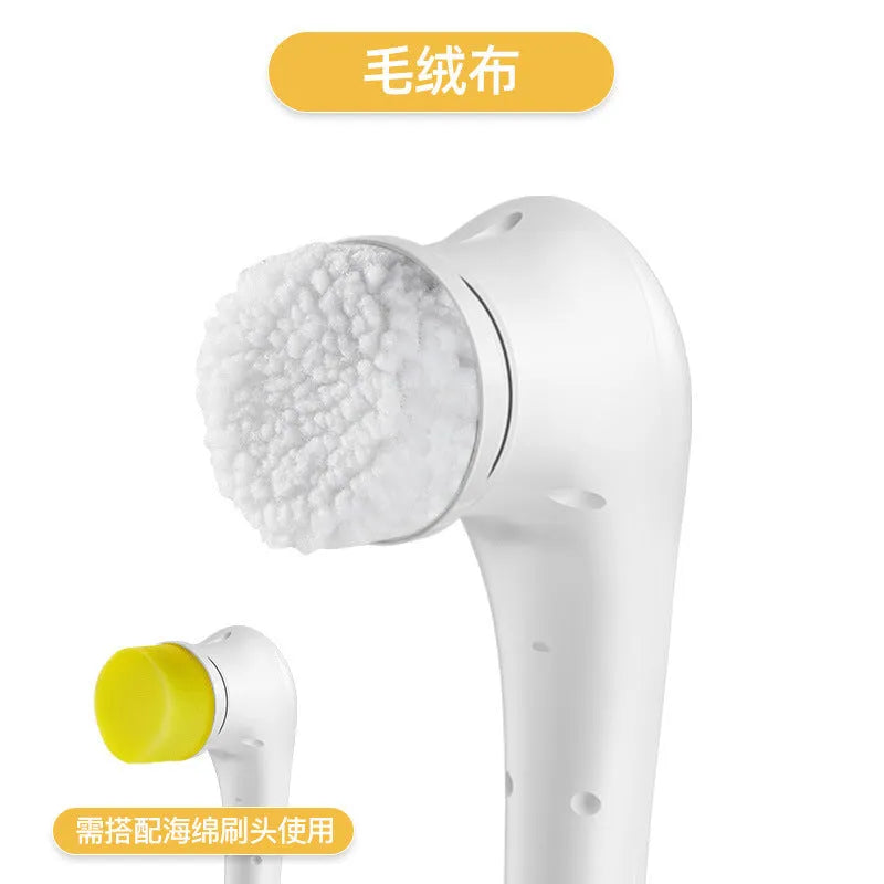 White USB rechargeable cordless electric cleaning brush with five different brush heads on a table.