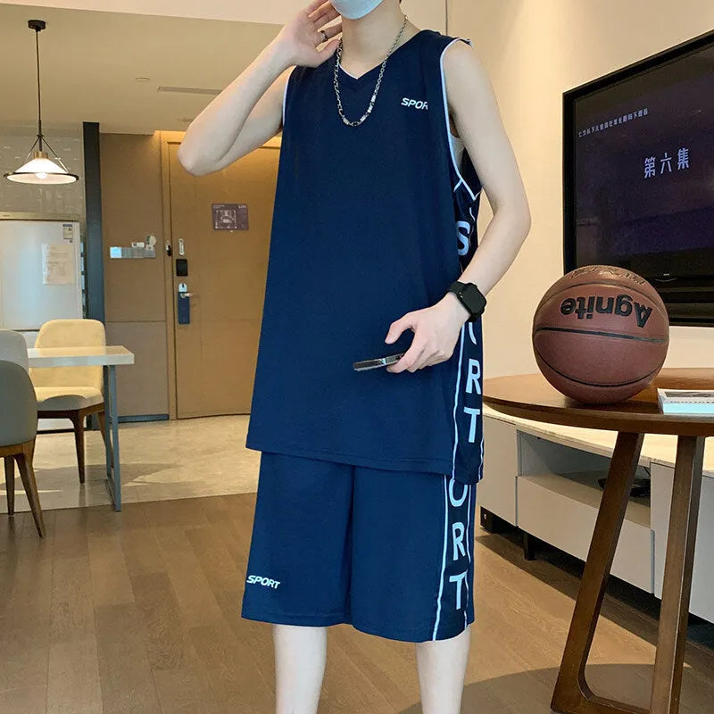 Polyester basketball sports suit with short sleeve vest and matching shorts in various colours