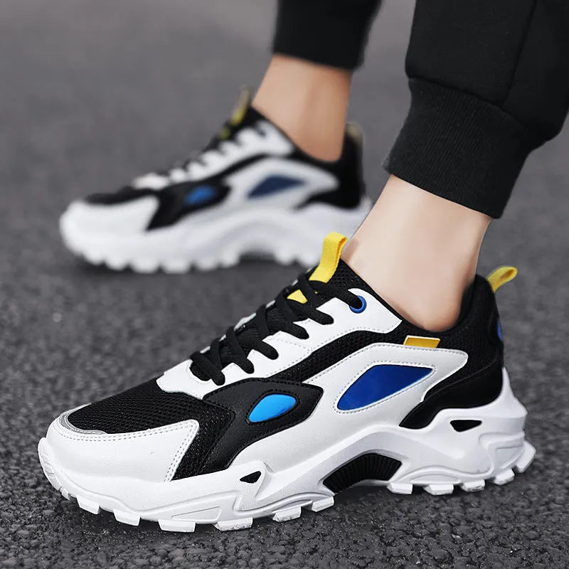 Men's breathable casual sneakers in black white colour-blocked pattern with lace-up front