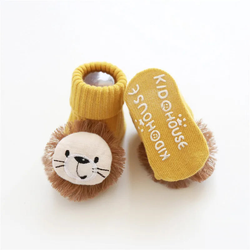 Cotton baby floor socks in assorted colours and prints like blue bow and pink stars on a size chart.