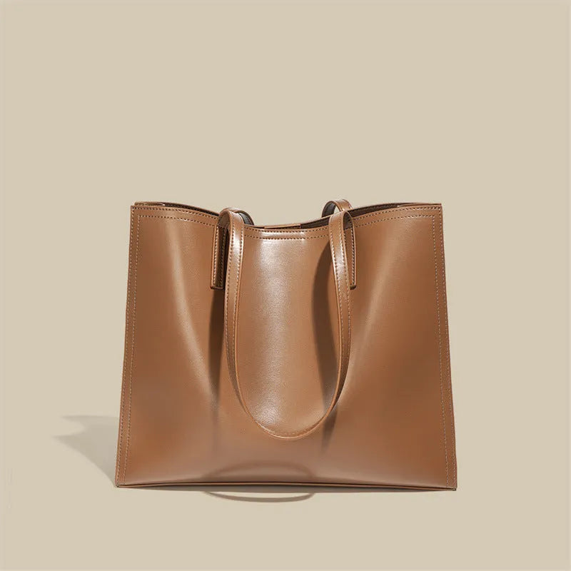 Women's brown genuine leather one shoulder handbag with multiple interior compartments