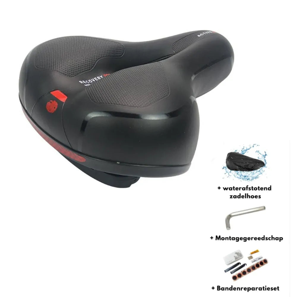 Black bicycle saddle with silicone padding and two visible steel springs underneath, shown with a waterproof cover and tools.