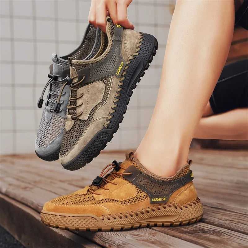 Men's brown suede casual shoes with elastic band closure and hand-stitched sole.