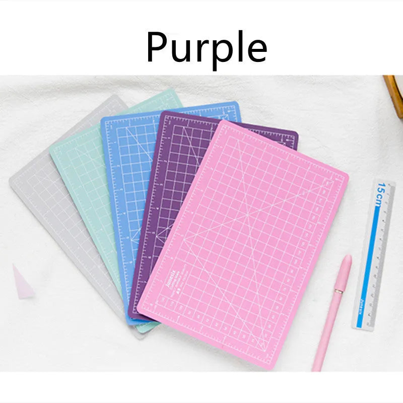 Art pen knife cutting board set with backing board, ruler, sharpener, and blade in choice of colours