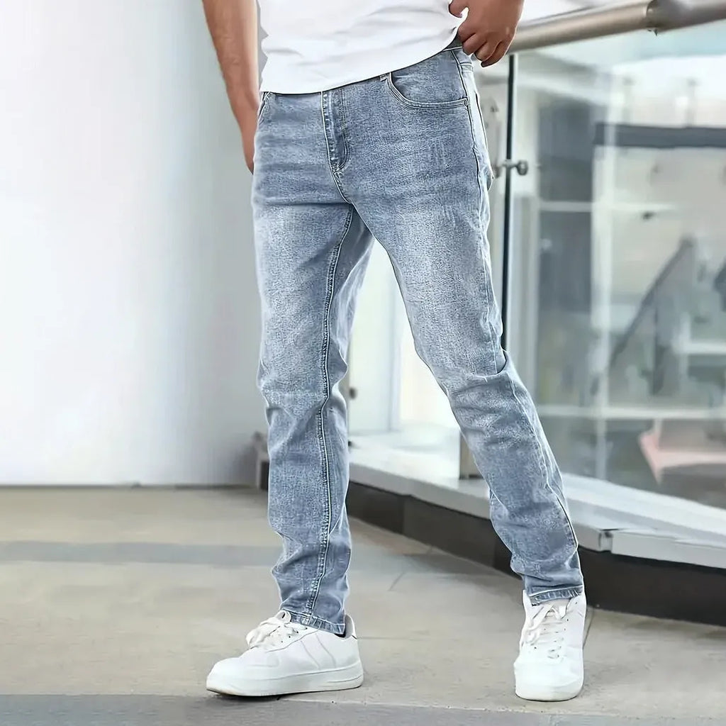 Men's straight leg stretch jeans in black, dark blue, and gray colours with skinny open leg style