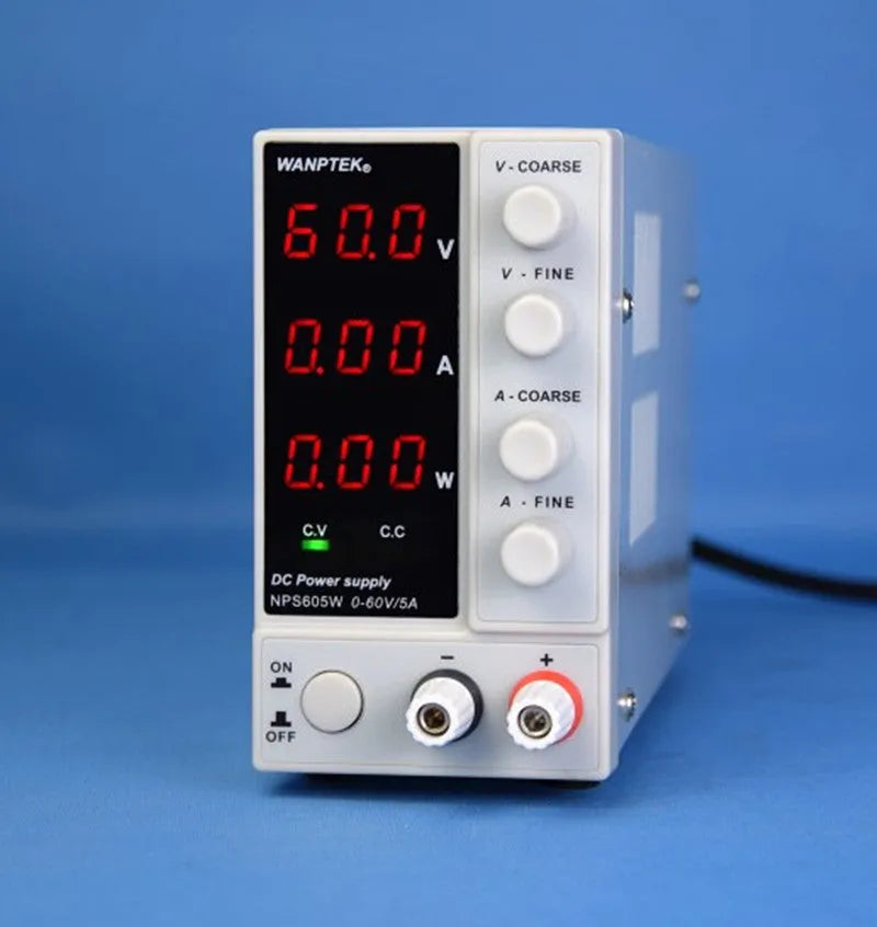 White adjustable DC power supply unit with digital display for electronics repair.