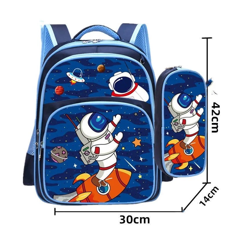 Blue cartoon-print children's school backpack with pencil case on a strap.