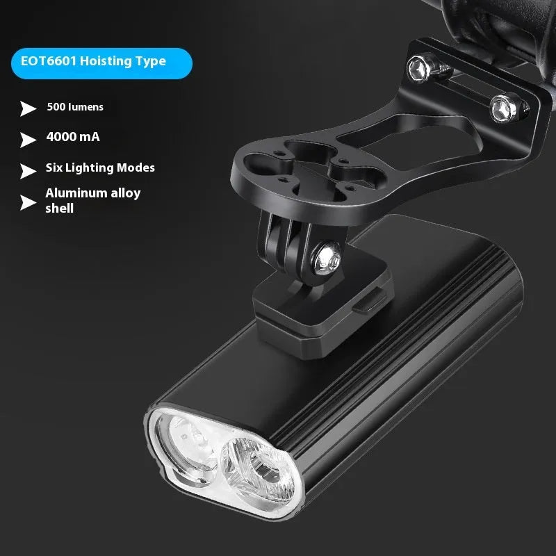 Aluminium bicycle headlight with twin LED bulbs and quick release mount showing USB Type-C charging port