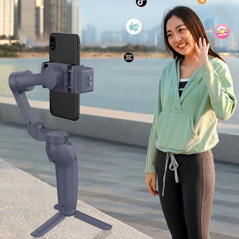 Three-axis anti-shake phone bracket with AI module in English version, ABS construction, small holder and charging cable included