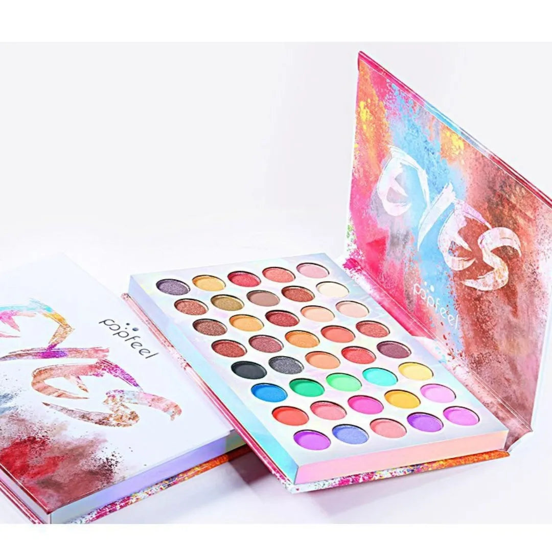 Shimmer matte multi-color combination eye shadow palette with twelve shades including purple, blue, black, sky blue, caramel, and red
