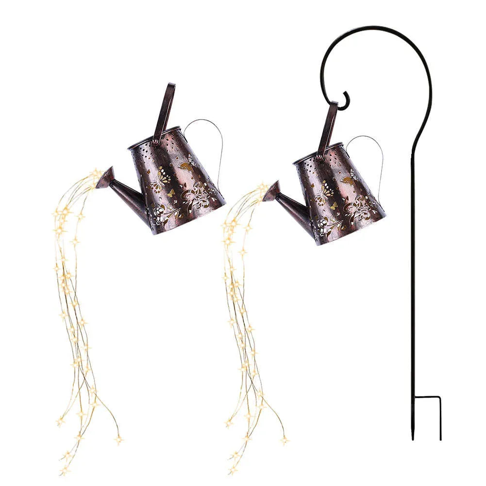 Solar-powered iron garden lamp with a tapered butterfly pattern emitting warm white light.