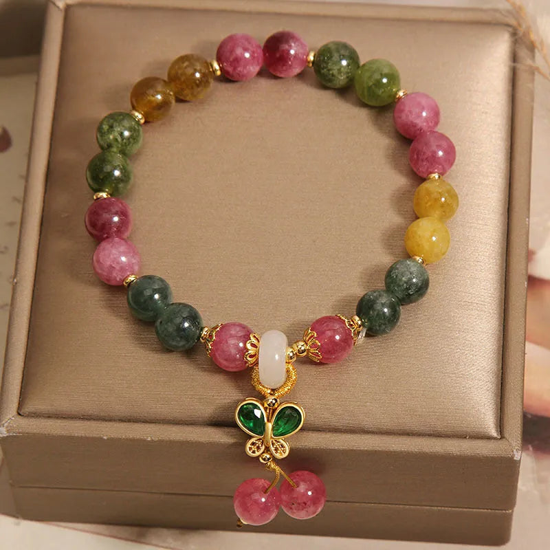 Butterfly pendant bracelet with colourful tourmaline gemstones in alloy setting and rhinestone accents