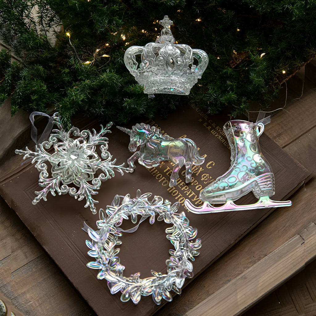 Transparent acrylic and plastic Christmas hanging decorations in snowflake, elk, icicle, and garland designs.