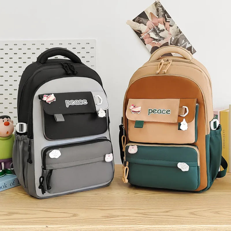 Women's large capacity nylon schoolbag 29x45x17cm with letter pattern, available in grey, khaki, purple, black, and blue
