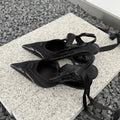 Women's black and pink special-shaped root lace-up high heels showing heel detail and lace fastening