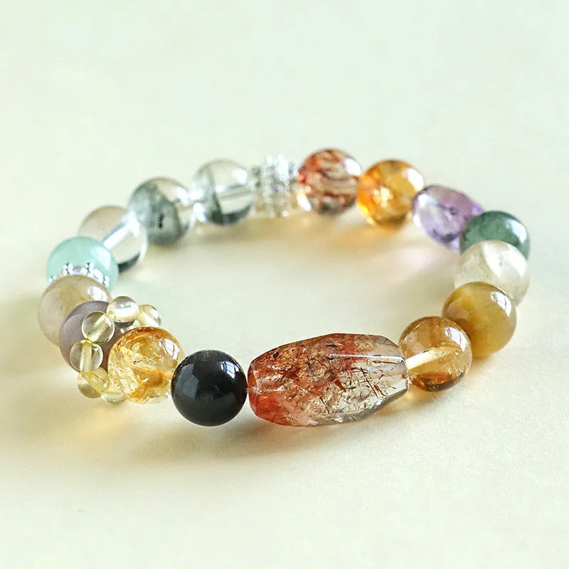 Close-up of a handmade black and gold natural crystal bead bracelet for women.