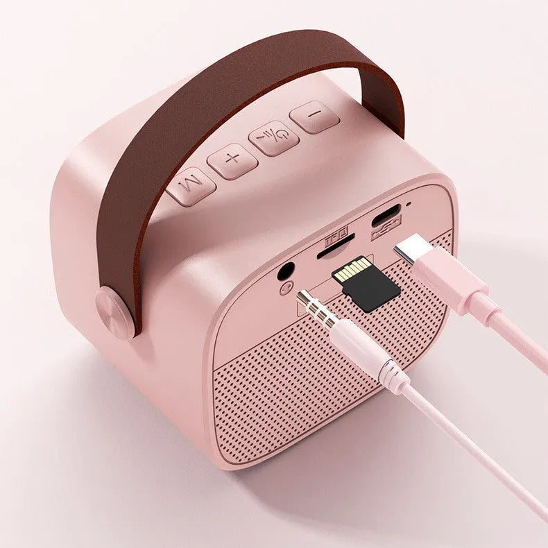 Compact white portable Bluetooth speaker with microphone for wireless audio and hands-free calling