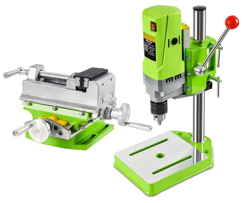 240W bench drill and milling machine on a workbench with heavy-duty steel clamping pliers.