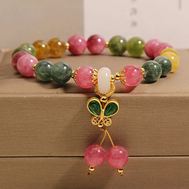 Butterfly pendant bracelet with colourful tourmaline gemstones in alloy setting and rhinestone accents