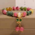 Butterfly pendant bracelet with colourful tourmaline gemstones in alloy setting and rhinestone accents