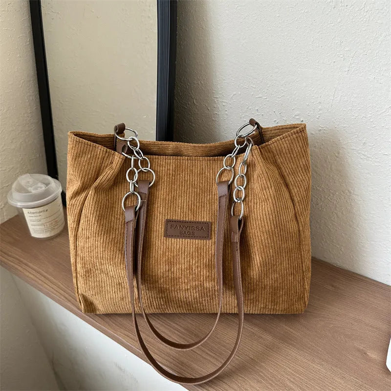Corduroy one-shoulder tote handbag in black, white or brown with three-dimensional pocket