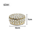 Transparent crystal glass jewelry box with a French gold metal frame in a European style.