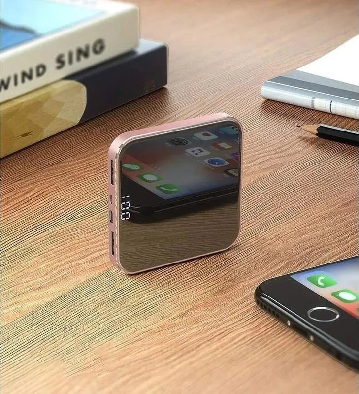 Ultra-thin mirror mini charging bank with LCD display and alloy shell in rose gold finish