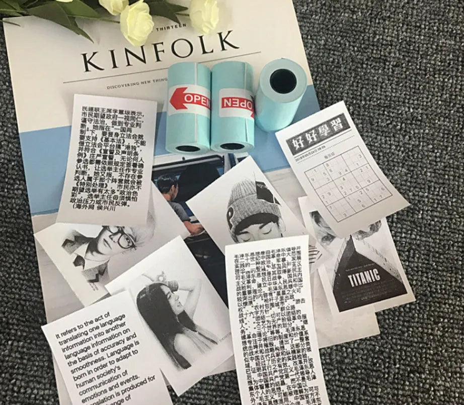 PerPage mini thermal printer paper rolls in regular, sticker, and label types with blue, pink, white, violet, and yellow options