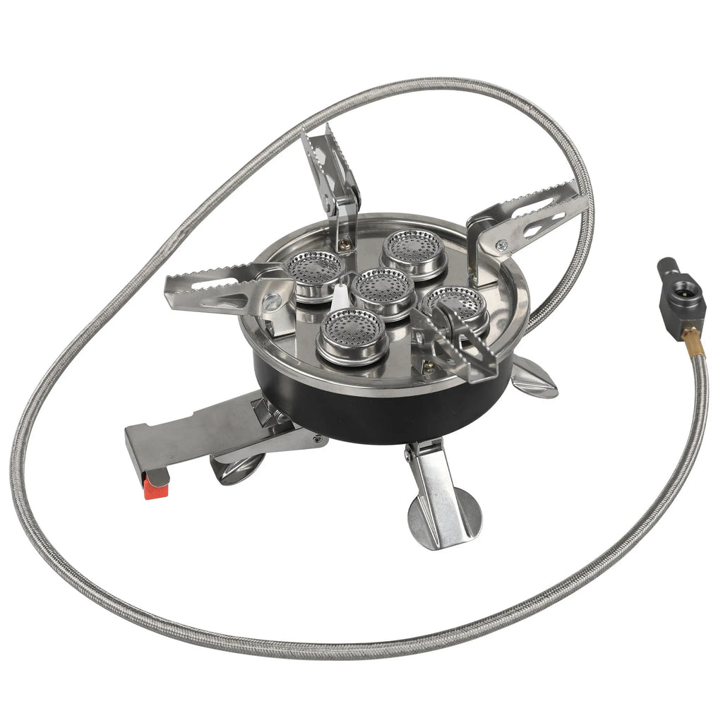Silver portable split camping stove with fuel hose, shown folded to compact size for transport.