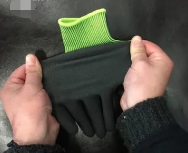 Green nitrile dipped breathable ultra-thin wear-resistant gloves WG501 on grey background