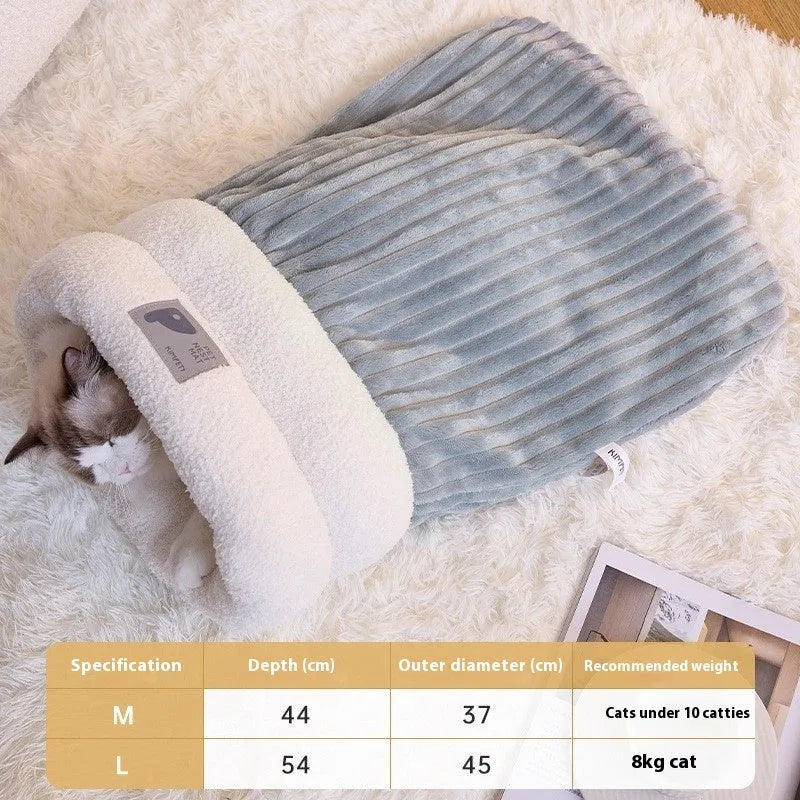 Brown semi-enclosed lambswool cat sleeping bag on a wooden floor.