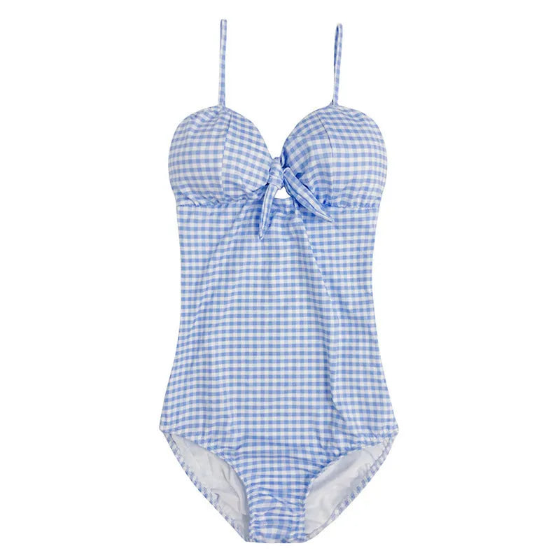 Blue and white plaid one-piece swimsuit for women on a hanger