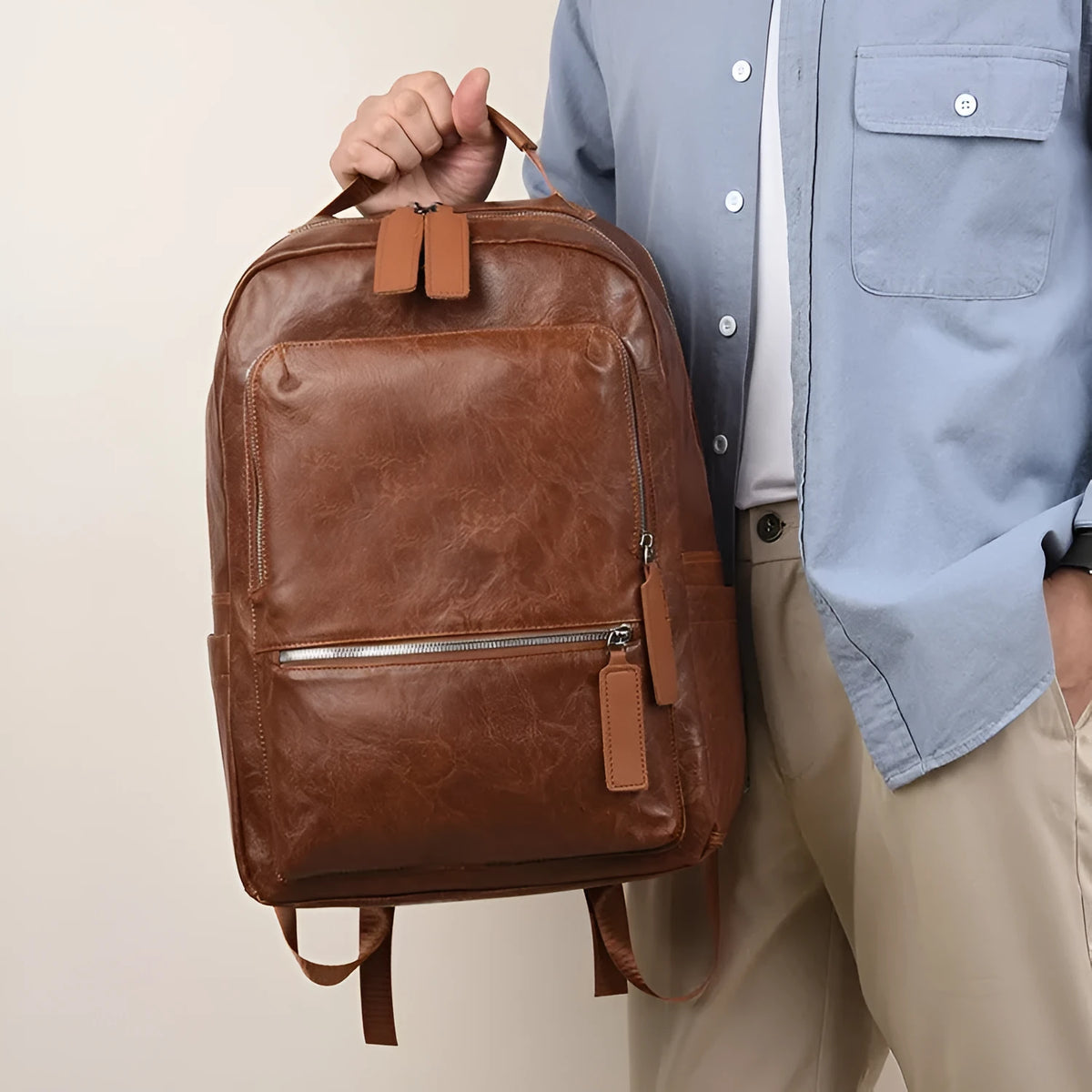 American vintage waterproof backpack 20-35L with PU lining and curved shoulder straps in black, brown, dark brown, or yellowish brown.