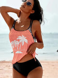 Women's loose-fitting black tangini bikini briefs with a split-leg design on a mannequin