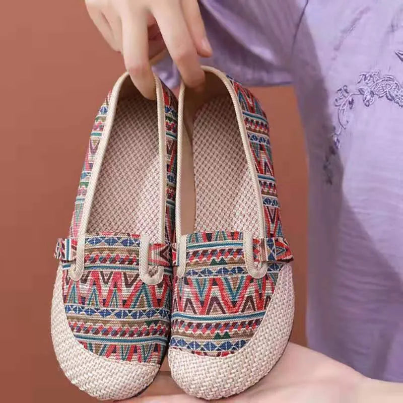 Women's flat-heel ethnic style cloth shoes in assorted colours with colour stitching and a shallow mouth design