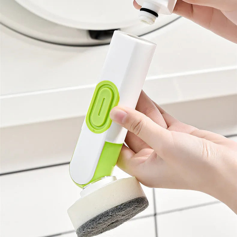 White and green liquid-filled cleaning brush with soap dispenser handle and two brush heads for kitchen cleaning
