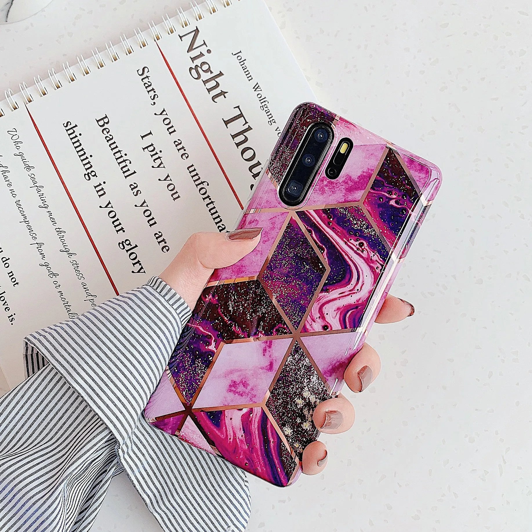 Electroplated marble design phone case for Huawei and Samsung smartphones in various colours.