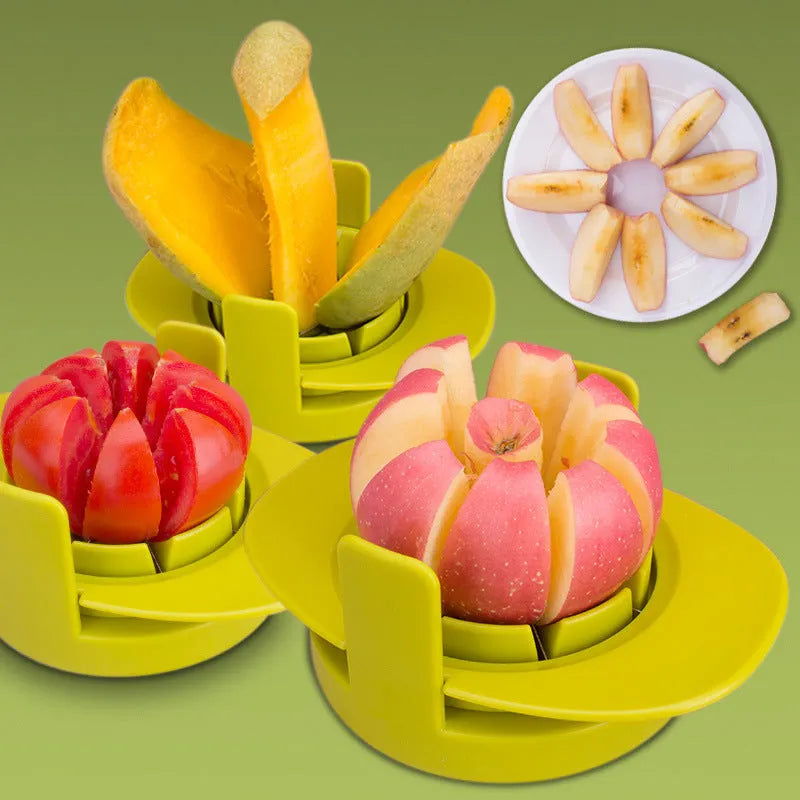 Green plastic fruit slicer for apple, tomato and mango cuts with base on a kitchen counter