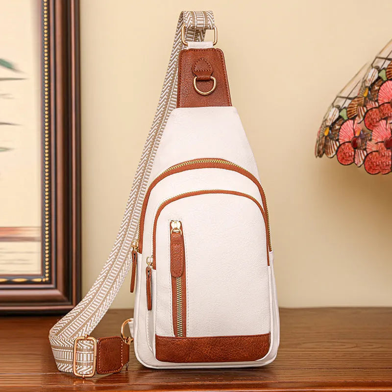 Soft brown women's crossbody chest bag with open pocket and sewing thread detail