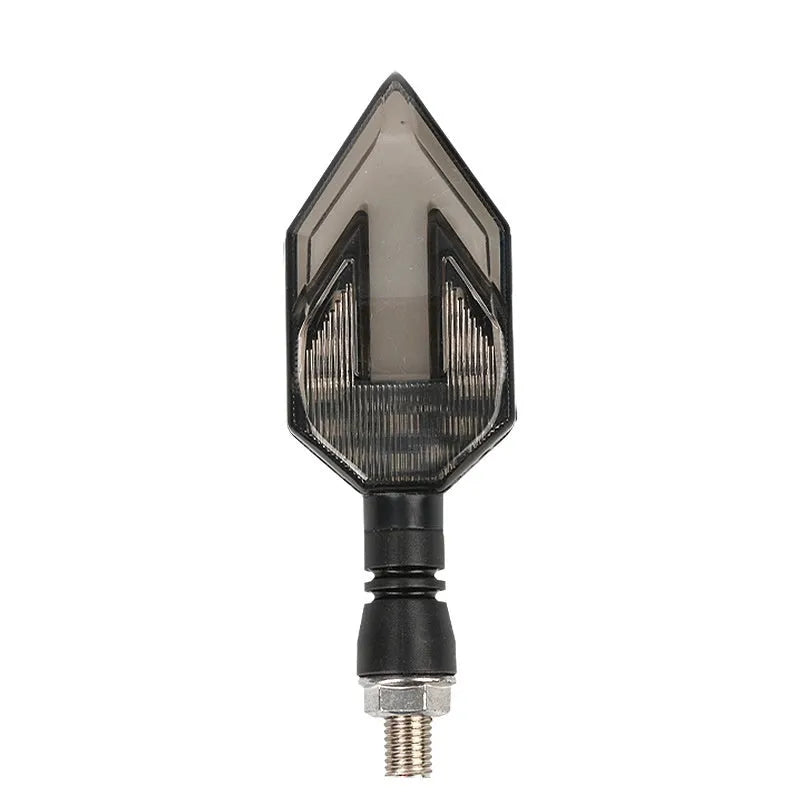 Arrow-shaped LED motorcycle turn signal light unit for 12V vehicles, shown in available colour options.