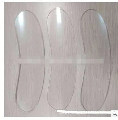 Transparent anti-wrinkle silicone neck pad measuring 200x60mm with gel texture, placed on a flat surface