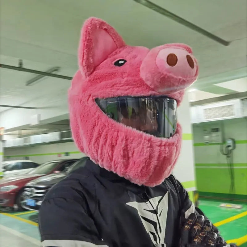 Pink pig cartoon plush protective hood cover for an average-sized motorcycle helmet.