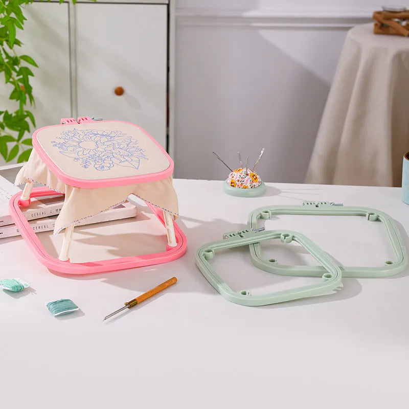 French desktop embroidery frame with adjustable double-layer ABS design in light purple on a table
