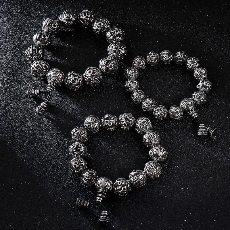 Titanium steel cast unisex bracelet with engraved text in 13mm width on plain background