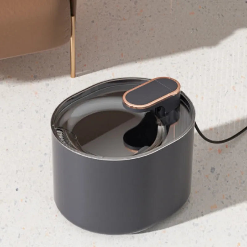 Automatic pet water fountain with USB cable, showing detachable bowl, pump, and filter in Berlin Blue colour.