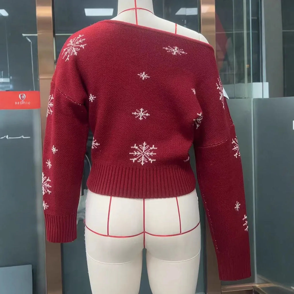 Women's snowflake jacquard pullover Christmas sweater in red with crocheted flowers and boat neck
